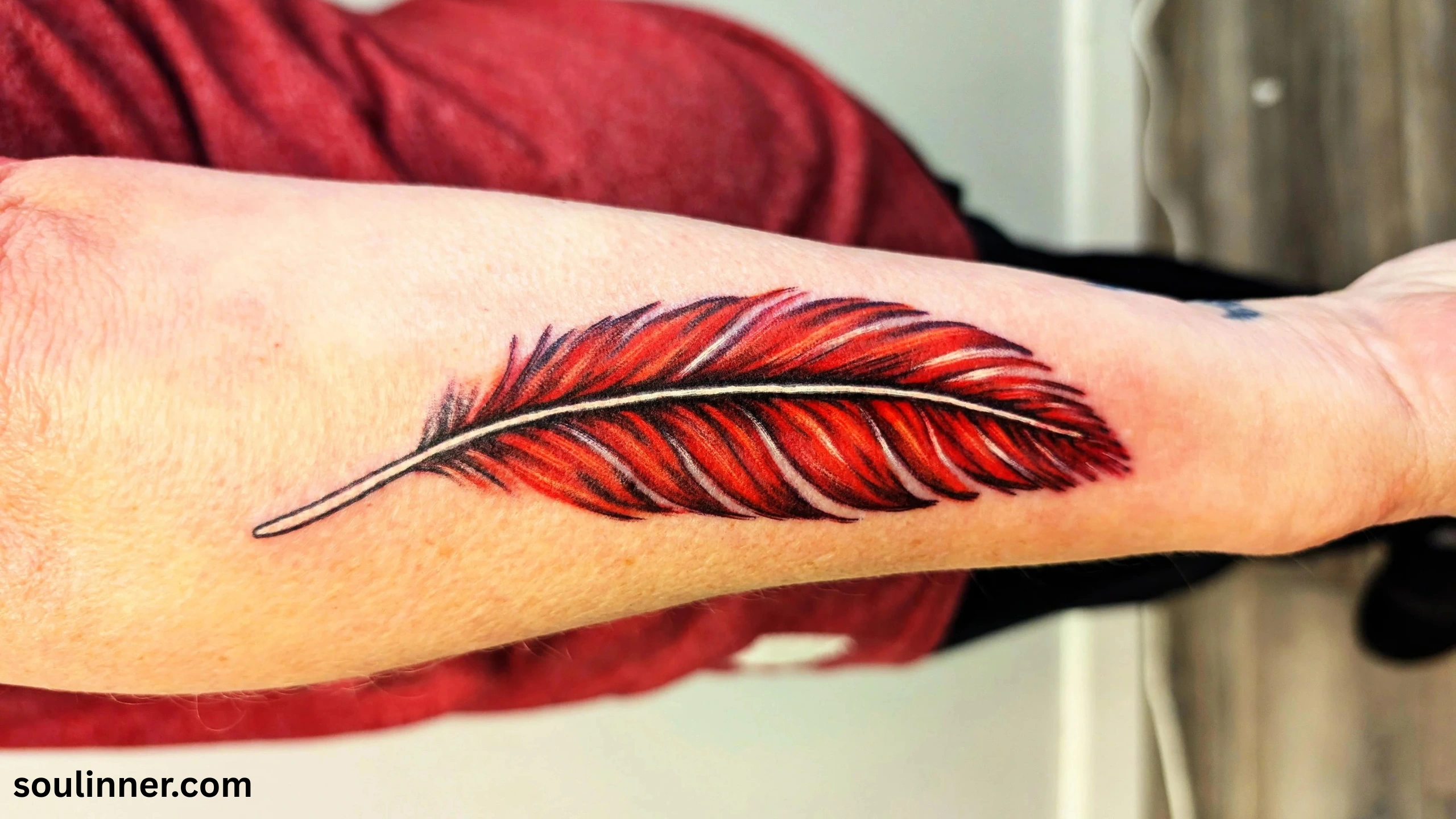 spiritual meaning of red feather