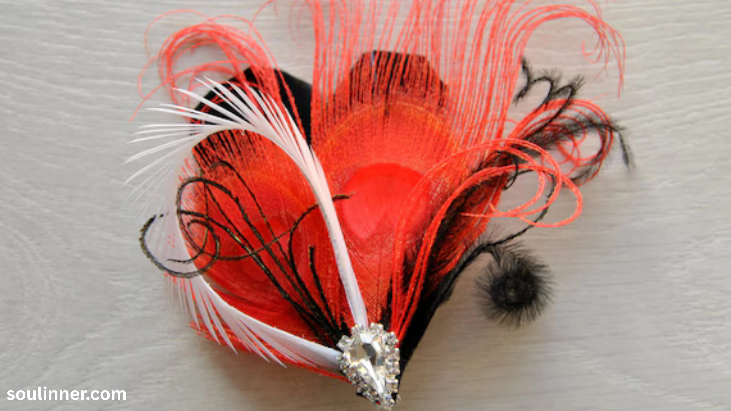 spiritual meaning of red feather