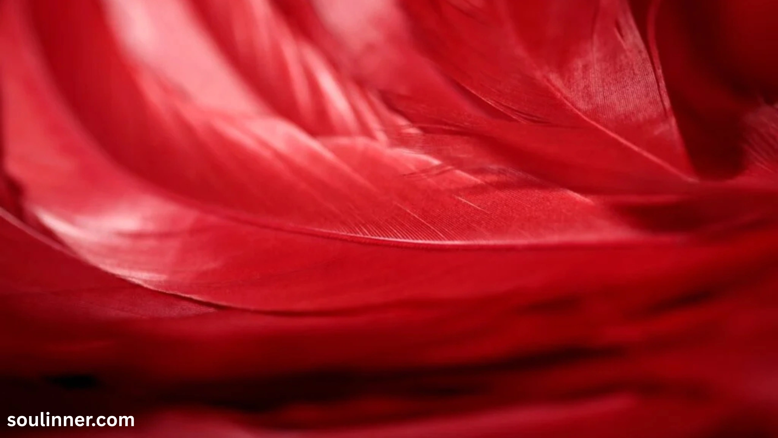 spiritual meaning of red feather